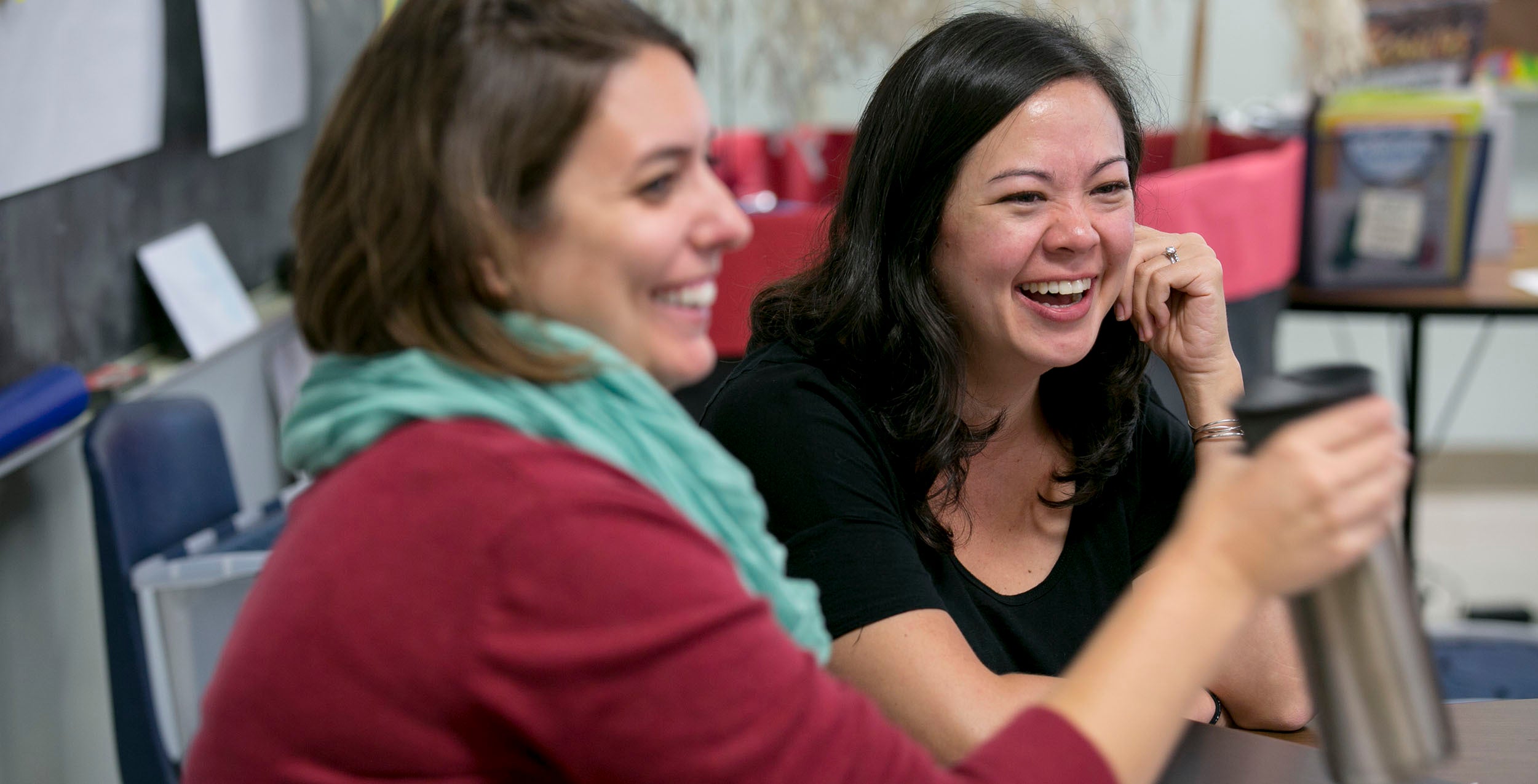 two women talking about OnRamps and enjoying some coffee